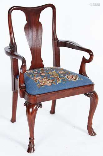 A mahogany elbow chair in Queen Anne style, c1950, with vase...