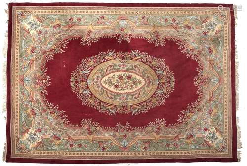 An Aubusson style red ground rug, 240 x 350cm Good condition