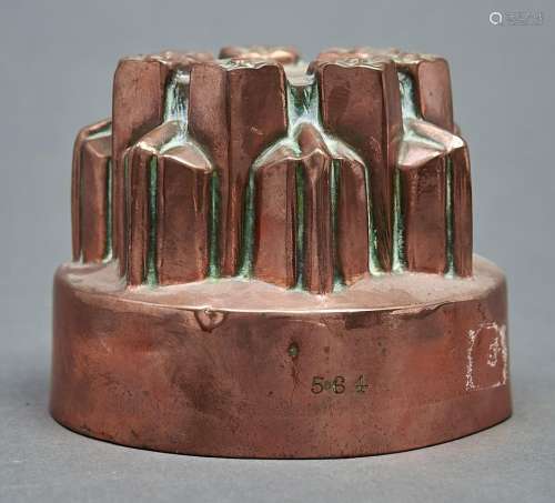 A Victorian copper jelly mould, stamped 564, 12cm diam, 9.5c...