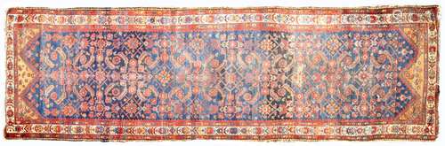 An antique runner, 110 x 345cm Losses at end, wear and much ...