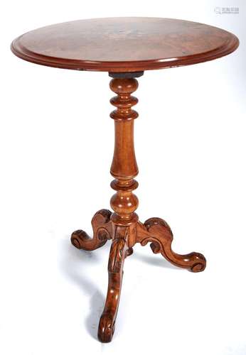 A Victorian walnut tripod table, the round, figured top inla...