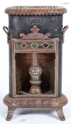 A Petrolux enamelled cast iron and black japanned tin stove,...