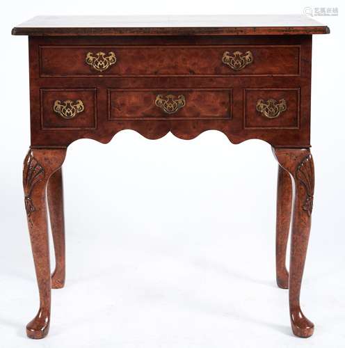 A reproduction burr elm veneered lowboy, late 20th c, the qu...