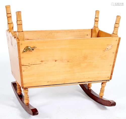 A 19th c style pine cradle, 75cm h; 42 x 83cm Good condition