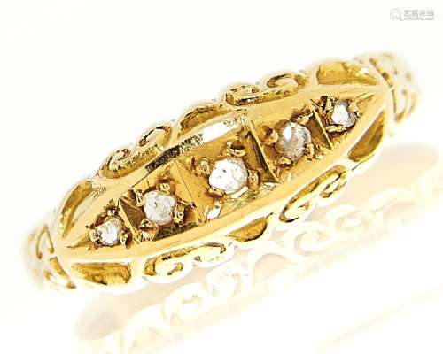 A five stone diamond ring with chip diamonds, in 18ct gold, ...