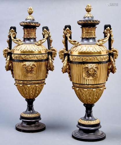 A pair of gilt patinated bronze vases and covers, 20th c, of...
