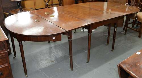 A George IV mahogany dining table, early 19th c, on twelve s...