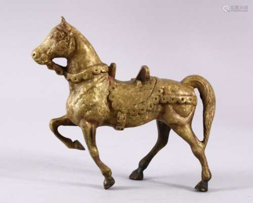 A HEAVY CHINESE BRONZE FIGURE OF A HORSE, in a striding pose...