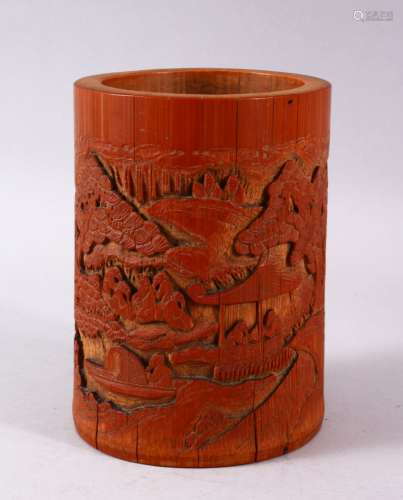 A CHINESE CARVED BAMBOO BRUSH POT, carved in canton style wi...