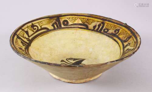 AN EARLY KASHAN POTTERY BOWL WITH KUFIC SCRIPT, the interior...