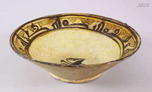 AN EARLY KASHAN POTTERY BOWL WITH KUFIC SCRIPT, the interior...