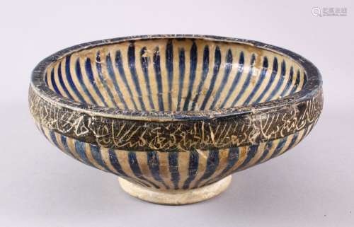 AN EARLY NISHAPUR POTTERY BOWL, the exterior with bands off ...