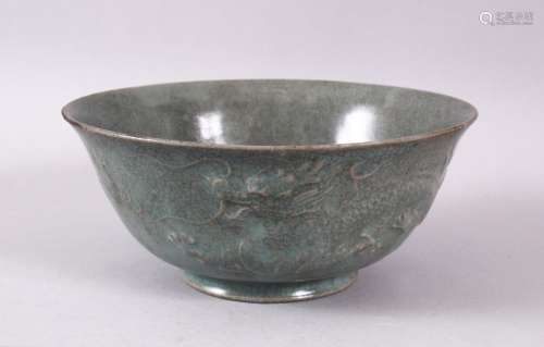 A CHINESE CELADON PORCELAIN DRAGON BOWL, the body with mould...