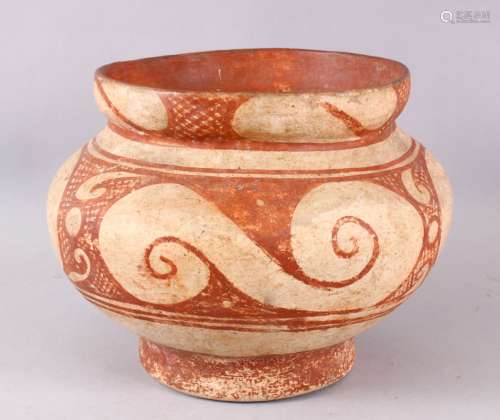 AN EARLY THAI BAN CHIANG POTTERY VASE, with stylized wave de...