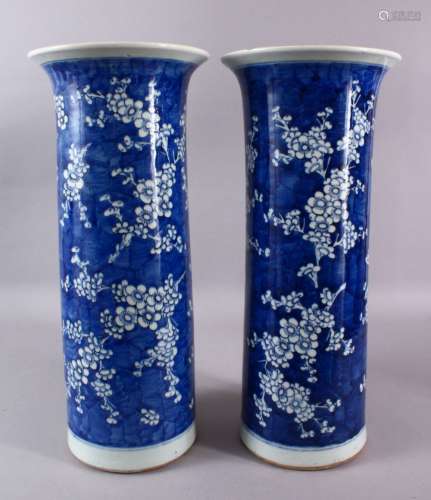 A LARGE PAIR OF 19TH CENTURY CYLINDRICAL BLUE AND WHITE PRUN...