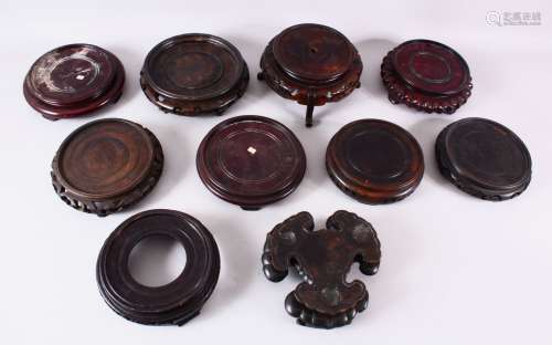 A MIXED LOT OF 10 CHINESE CARVED HARDWOOD STANDS - each of v...