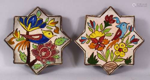 A SMALL PAIR OF IRANIAN POTTERY STAR FORMED TILES, each deco...