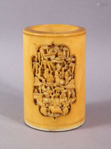 A 19TH CENTURY CHINESE CANTON IVORY BRUSH POT, finely carved...