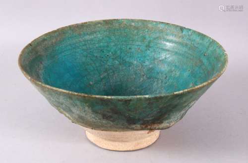 A 13TH CENTURY IRANIAN KASHAN POTTERY TURQUOISE BOWL, 18CM.