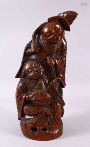 A CHINESE BAMBOO CARVING OF TWO FIGURES, 34cm high