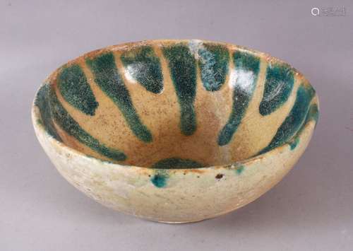 A 12TH CENTURY ABBASID POTTERY BOWL, with a turquoise drip g...