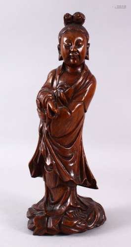 A CHINESE CARVED WOODEN FIGURE OF GUANYIN, 37cm high