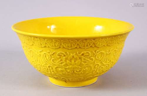 A CHINESE YELLOW GLAZED MOULDED LOTUS PORCELAIN BOWL - the b...