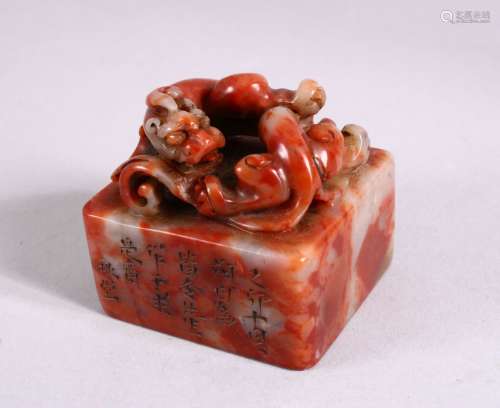 A CHINESE CARVED SOAPSTONE SEAL, carved with chilong and cal...