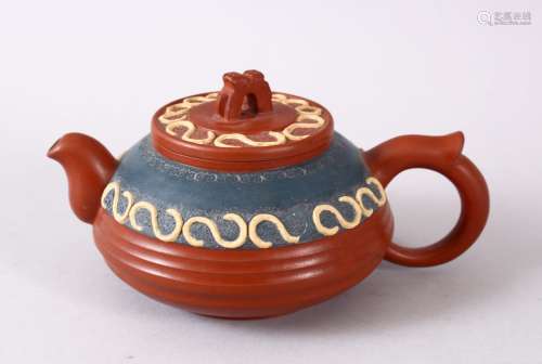 A CHINESE YIXING CLAY TEAPOT, with moulded and poly chrome d...
