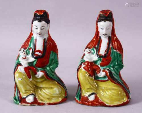 A PAIR OF 19TH CENTURY CHINESE FAMILLE VERTE POTTERY FIGURES...
