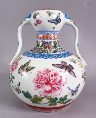 A CHINESE FAMILLE ROSE PORCELAIN TWIN HANDLE VASE, The body ...