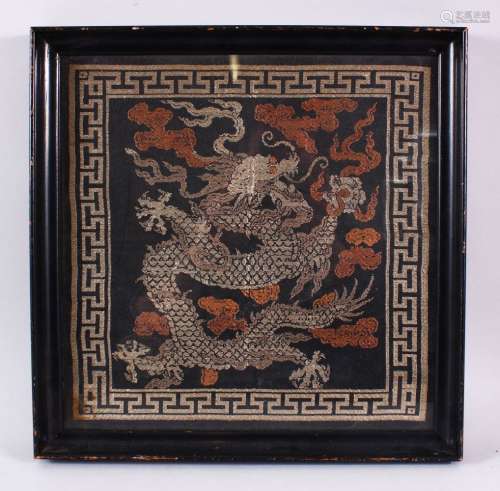 A CHINESE FRAMED FIVE CLAW DRAGON TAPESTRY, the five claw dr...