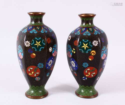 A PAIR OF CHINESE CLOISONNE BLACK GROUND VASES - each with a...