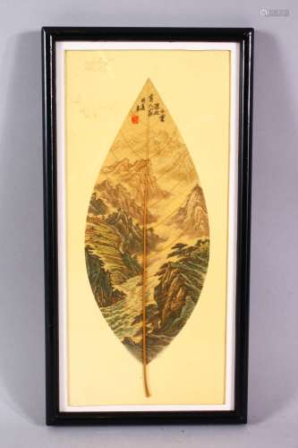 A CHINESE PAINTED & FRAMED BANYAN LEAF, the leaf painted wit...