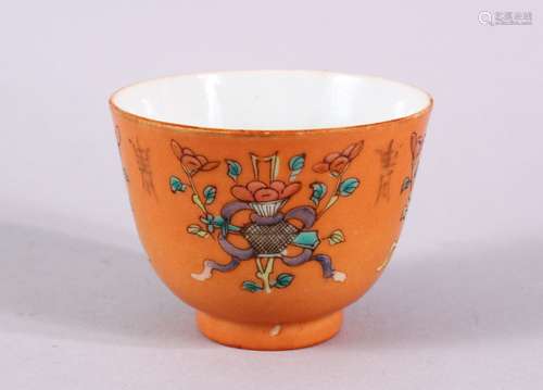 A CHINESE ORANGE GROUND PORCELAIN CUP, with an orange ground...