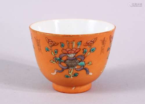 A CHINESE ORANGE GROUND PORCELAIN CUP, with an orange ground...