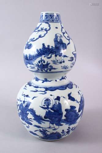 A CHINESE BLUE & WHITE DOUBLE GOURD PORCELAIN VASE, decorate...