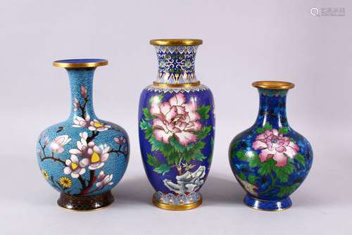 A MIXED LOT OF THREE CHINESE CLOISONNE VASES, each with a va...