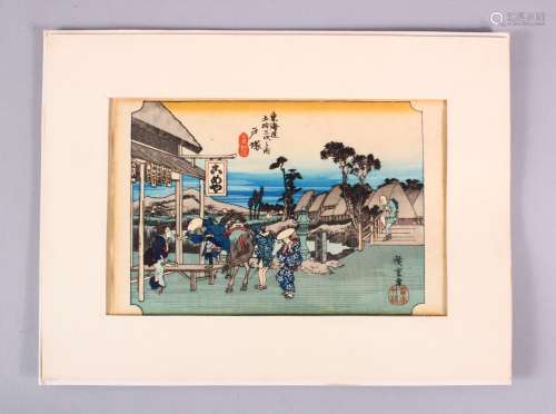 A JAPANESE WOODBLOCK PRINT - FIGURES AND HORSE - the figures...