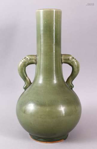 A CHINESE CELADON GLAZED TWIN HANDLE PORCELAIN VASE, with tw...