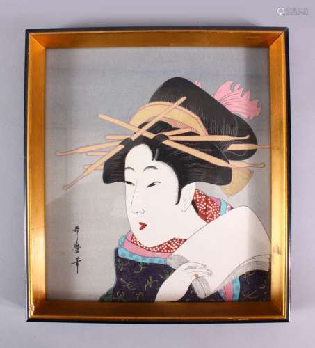 A JAPANESE WOODBLOCK PRINT OF A KABUKI ACTOR - KITAGAWA UTAM...