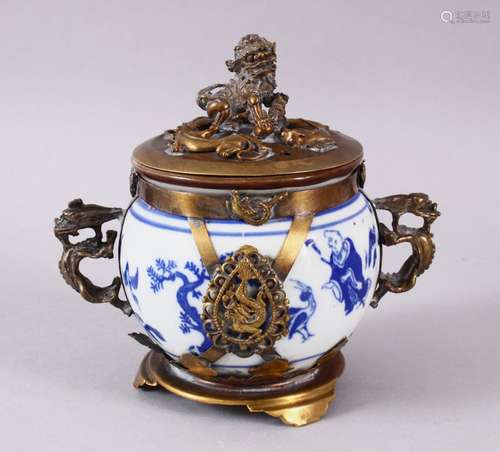 A CHINESE BLUE & WHITE JAR & COVER, with metal mounts and co...