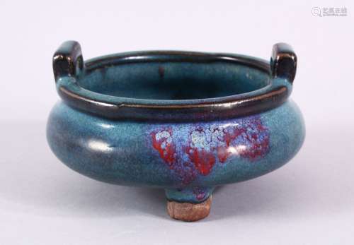 A CHINESE JUN WARE TWIN HANDLE CENSER, with a graduated blue...