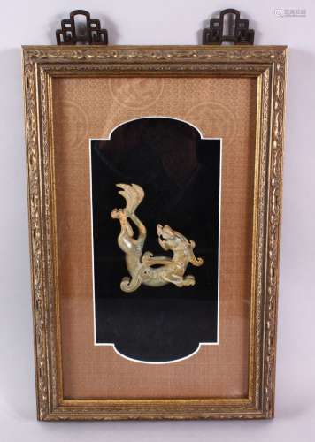 A GOOD CHINESE FRAMED CARVED JADE FIGURE OF A CHILONG, the a...