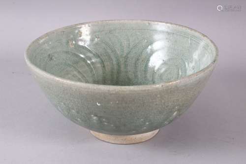 A GOOD THAI SUKHOTHAI CELADON POTTERY BOWL, with moulded int...