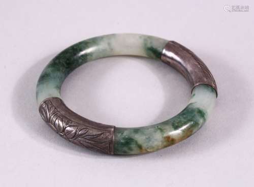 A CHINESE CARVED MOSS GREEN & WHITIE METAL BANGLE, the jade ...