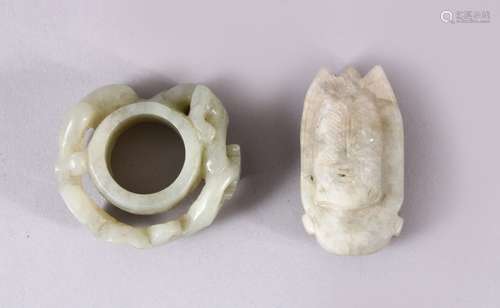 TWO CHINESE CARVED JADE PENDANTS, one carved with chilong, 5...