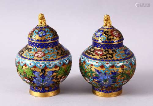 A PAIR CHINESE CLOISONNE JAR & COVERS, each decorated in sim...