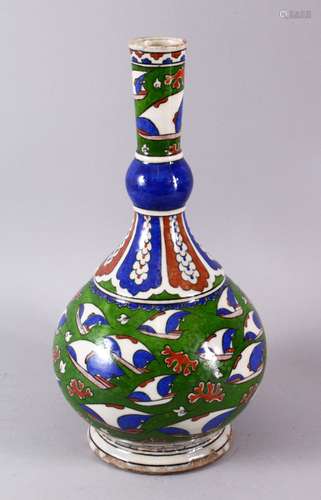 AN 18TH CENTURY TURKISH IZNIK POTTERY LONG NECK VASE, the bo...