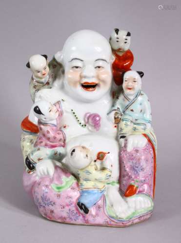 A CHINESE REPUBLIC STYLE FAMILLE ROSE PORCELAIN FIGURE OF BU...